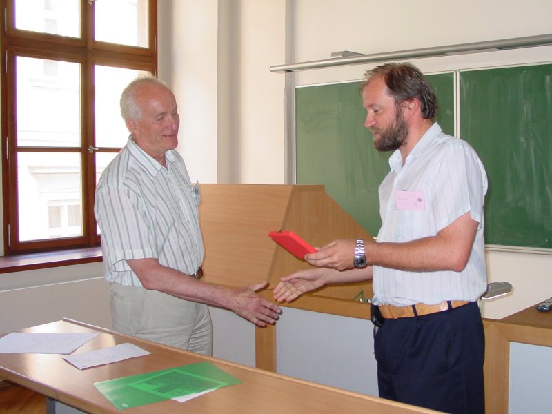 Prof. Lukes being awarded the memorial medal of CMS JCMF